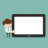 Businessman pointing to the screen of a tablet