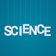 Science text with paper letters attached to string over yellow