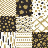 Set of hand-drawn seamless trendy patterns with ink brush strokes