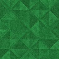 Seamless geometric triangle design on green glitter paper