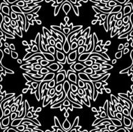 Seamless background made of exotic pattern in black colors
