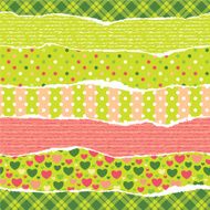Torn wrapping paper with Christmas patterns