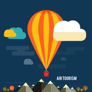 Hot air balloon flying over the mountain