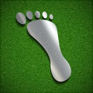 Footprint of steel on the surface grass