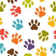 Colorful dog paw print vector pattern