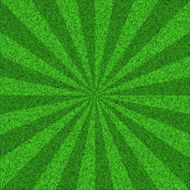 Green textured burst background with rays