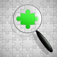 puzzle and magnifier