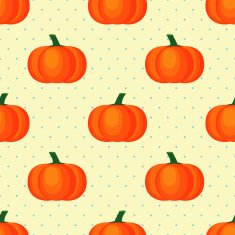 Seamless vector pattern with pumpkins on polka dots background