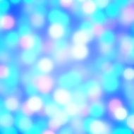 Blurred purple green and beige multicolor bokeh dots