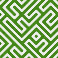 Seamless green glitter maze pattern on white paper