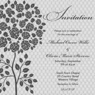 Rose and tree styled wedding invitation on a grey background