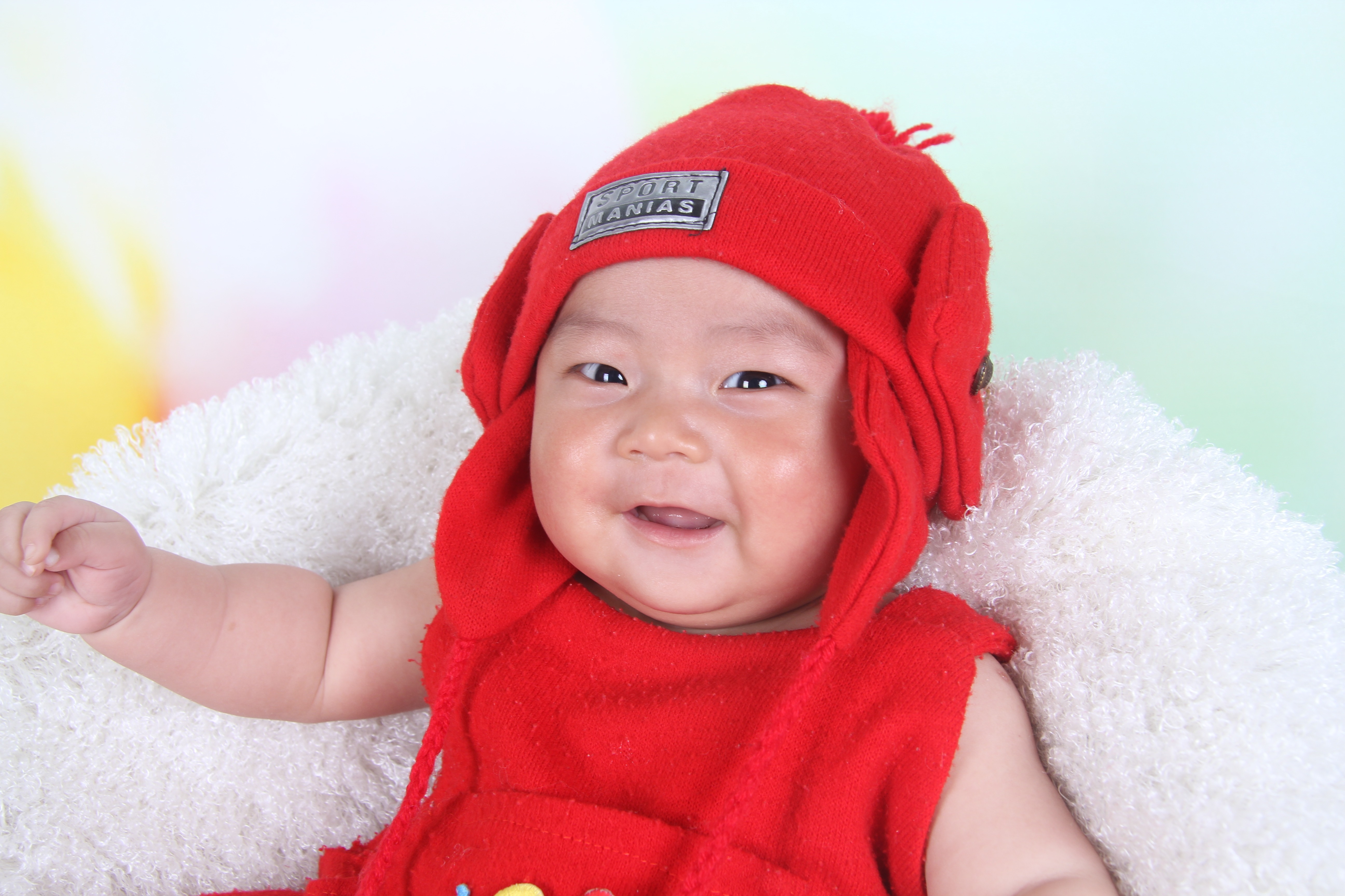 Baby in red at the photo shoot free image download