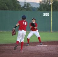 boys playing baseball