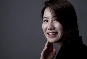 portrait of a smiling asian woman