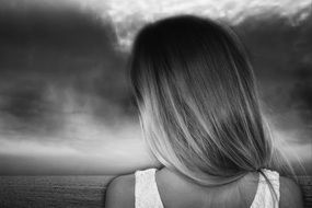 girl long hair blond sea view