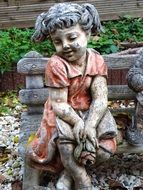 girl's stone statue