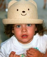 cute baby girl in straw hat