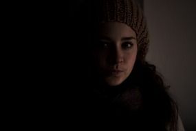 Portrait of the girl in a dark