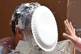 Whipped cream on face