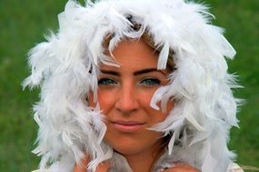 Portrait of beauty girl with snowflakes on her head