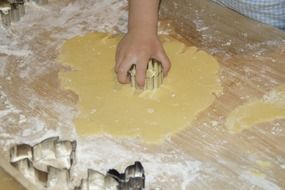child baking cookies