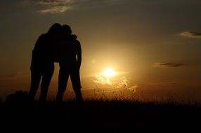 mother sunset mood silhouette with son