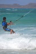 kite surfing, sports man on sea waves
