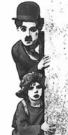 charlie chaplin with a boy stands behind a tree