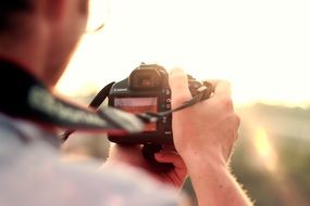 photographer with canon camera