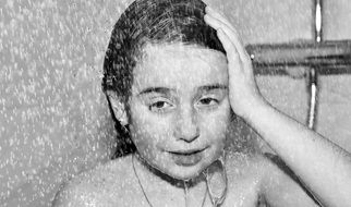 young girl taking shower