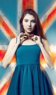 beautiful girl on the background of the flag of britain