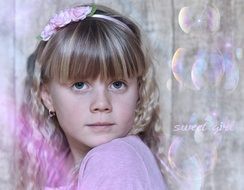 pretty blond girl portrait in pink colors