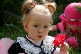 Baby girl with flowers