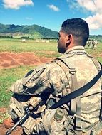soldier in uniform with a weapon