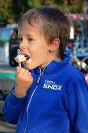 a child eating ice cream