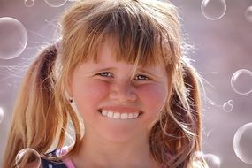 baby girl with huge teeth