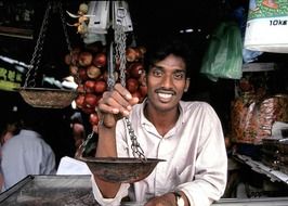 happy shopkeeper in Sri Lanka