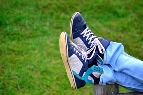 men shoes on my feet on a blurred background