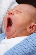 baby boy yawning, portrait