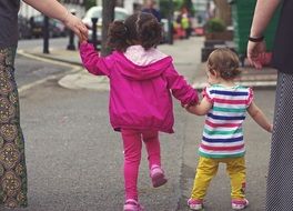 happy kids on a city street