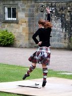 girl dancing in a kilt