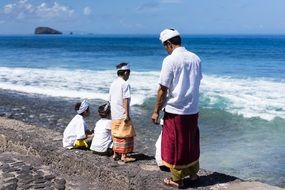 People on seashore bali