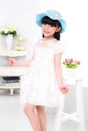 asian girl in a blue hat portrait