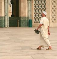 man goes to moslem mosque in Morocco