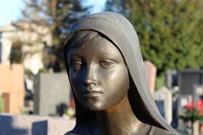 statue of a sad girl