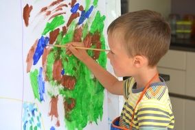boy child painting brush