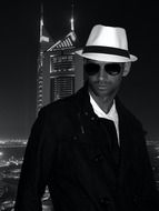 man in white hat