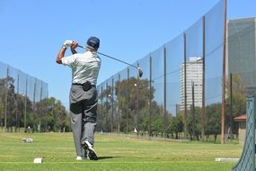 insanely beautiful golfing man