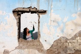 woman in ruin box