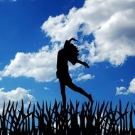 silhouette of a girl in a jump